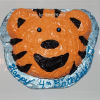 Tiger Cake This was for my DS 4th b'day. Used the same pan for my DD's Panda cake. Tried to make the BC messy to resemble fur. Had a real...