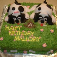 Puppy Dogs This was a cake for a 9 year old girl that requested a puppy dog cake. It's pound cake with bc incing, and the puppies are covered in...