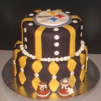 Steelers Groom's Cake This was a Groom's cake for a BIG Steelers fan! It was right after the super bowl! Everything is covered in fondant and the little...