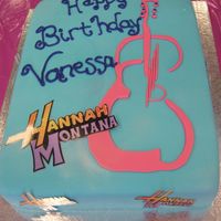 Hannah Montana Cake Vanilla Rum cake covered in fondant. The design and colors matched the napkins and plates.