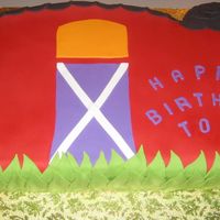 Red Barn Light vanilla rum cake, filled and lightly coated with butter cream then topped with fondant. The shape and colors cordinated with the &...