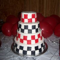 Gradcake.jpg Customer wanted Red ad Black checkerboard design, no borders, no toppers no nothing! That's what they got!