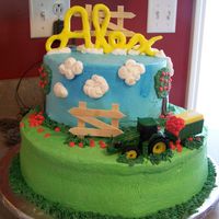 John Deere Birthday Cake All Buttercream Icing except fence and Name at the top. The name is Fondant