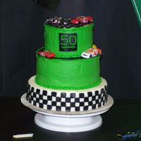 50Th Birthday Nascar Cake Made this for my Dad's 50th birthday. Only the bottom tier has MMF on it. Wish I would have covered the rest in MMF or used the tip to...