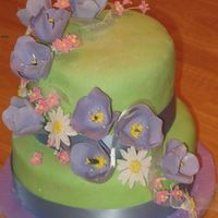 Tulip, Daisy, Apple Blossom Anniversary Cake I made this for my the 3rd anniversary of my DH and mine. Bottom layer is carrot cake, cream cheese frosting and MMF. Top layer is lemon...