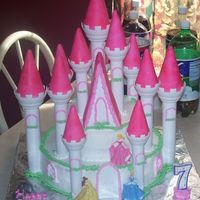 Castle Cake! This is a castle cake I made for my daughters 7th birthday.It is my first time making a castle cake.I used the wilton castle kit.I had my...