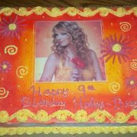Taylor Swift! I made this for my niece.1/2 sheet fudge marble cake with whipped buttercream icing.