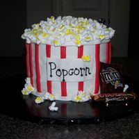 Popcorn Cake Thanks to gladds for her help on the cake. WASC cake with BC and fondant. Took this to my daughter's elementary school family fun...