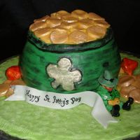 Day 2008 Chocolate Pound Cake covered in MMF with MMF and gumpaste decorations. The "gold" is fondant brushed with gold luster dust.