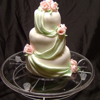 Draped Cake WASC cake with Pink Gumpaste Roses and Green Fondant Drape. 4", 6", 8" tiers. This was for an uncle's bridal shower -...