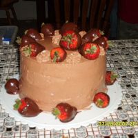 Cakes.jpg I got this idea from another cc'er and made this for my father in law's birthday. The cake is strawberry with chocoalte dream...