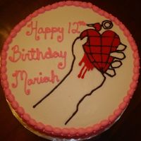 Green Day Birthday Cake Birthday cake with Green Day (band) logo. White cake, raspberry filling & buttercream dream icing.