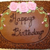 Chocolate Birthday Cake Buttermilk chocolate cake with chocolate mousse filling and chocolate buttercream icing.