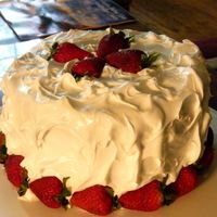 Strawberry Cake From scratch strawberry cake with whipped cream icing.