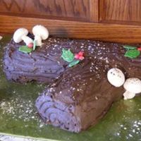 Dscf1377.jpg Yule log. Chocolate cake with strawberry cream cheese filling and dark chocolate buttercream frosting. Thanks to cakecentral's...