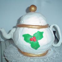 Gail's Christmas Tea Pot. This is the tea pot I made for my Aunt Gail. The cake is vanilia pound cake. Butter cream icing. Fondant accents painted with old gold...