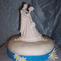 5Th Anniversary Cake This was my first ever try at working with fondant. My cake was not as smooth as I had wanted, but you have to start somewhere! The cake...