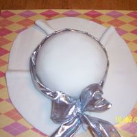 Mmf Hat Cake With Silver Ribbon This is from my first batch of Rhonda's Ultimate MMF! Awesome recipe!!! I had some extra mix let from cupcakes and cooked a tiny cake...