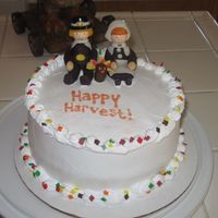 Happy Harvest I made this cake for thanksgiving for my family I did these pilgrims in less then hr on thanksgiving the pilgrims were made with fondont...