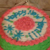 S7300254.jpg I applied the basket weave technique around the cake and Tip 16 for the stars in the middle. I want to thank Ms. Wanda for showing me these...