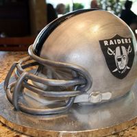 Raiders I carved this from a 9" round cake that was approx 5" tall.The decals were done on edible image paper.
