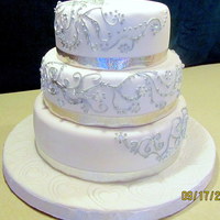 September Wedding Painted the royal icing with silver airbrush color.