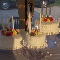 100_0290.jpg This was my first wedding cake. I was very disappointed in how it turned out. Everyone loved it, but maybe it was because they knew me. I...