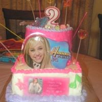 Hannah Montana (Kadance) Turns 2 Kadance (2) loves Hannah Montanta. We made her this cake to help her celebrate. This is the second version because in the first versionthe...