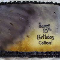 Modifiedcolton10Th.jpg For my son's birthday. He is into storms and asked for a tornado cake so here is my version. Airbrushed tornado and an attempt to make...
