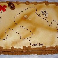 Looking For Treasure 9" x 13" fudge cake, buttercream icing and fondant decorations. Second time working with airbrush. Made for a young man who likes...