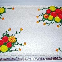 91Stbday1.jpg Birthday cake for someone celebrating their 91st birthday. wasc cake and buttercream frosting. Request was for yellow and red roses and no...