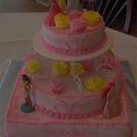 Disney Princess Cake I made this cake for my niece's 4th birthday. I bought the princesses in a set from the Disney store. It is strawberry cake with pink...