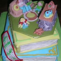 Family Story Time This cake was done for a customer's son, who loves when the family sits by the fireplace and reads books. He loves to read, and he...