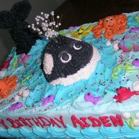 A Whale Of A Birthday Idea from the Wilton cake book, with some of my personal touches.9x13 cake, whale is the petite doll mold, tail is plastic dowel rod, iced...