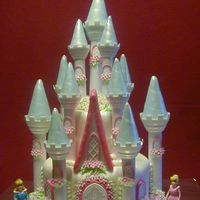 Princesscastle Cake Dark Chocolate cake with BC layers. Covered and decorated in fondant.For my nieces 4th birthday. All she wanted was a pink and blue castle...