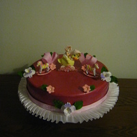 Sweet In Pink Gumpaste flowers. Dummy Cake covered in Fondant. Decorations from the 99cent store. Dusted with pink pearl.