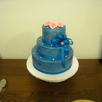 Swiming In Blue fondant accent, royal icing flowers, fondant cake