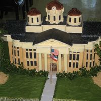 County Courthouse The roof was made of foam board and covered in fondant. The base of the cake was mostly cake and covered in fondant. The cake had to feed...