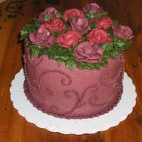 Flowerswemboss.jpg Made this for a friends b-day. Whole cake and flowers out of buttercream frosting. Thanks for looking. Cindy