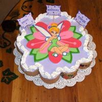 Tinkerbell Pull Apart Cupcakes Made this for a friends daughters b-day party. Made color flow piece and put it on right before delivery on whip cream frosting. Thanks for...