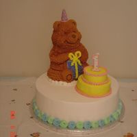 Classic Pooh First Birthday I made this cake for my daughter's first birthday. The little cake was just for her.