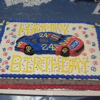 Jeff Gordon Birthday All white cake w/ vanilla pudding filling...Buttercream frosting,the car I cut out of another sheetcake and decorated by eye...VeryHappy...