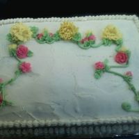 Flowers this cake was a last min cake for a company BBQ for my husband.