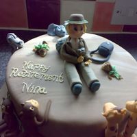 Front_Ninas_Cake.jpg 10" Madeira cake, filled with buttercream. Inspired by Suzie Edwards, who i found online while looking for safari ideas. Female...