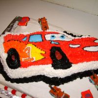 Lightning Mcqueen From Cars I made this for my friend's son's first birthday. I used the wilton pan and set it on top of an 11 x 15 single layer.