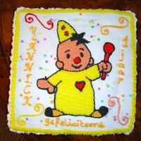 Bumba The Clown cake filled with preservers and buttercream.