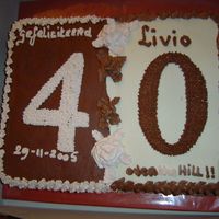 Hubby Is Over The Hill this is a duo cake vanilla and chocolate, chocolat with a chocolate mous filling and vanilla with a cherrie buttercream filling.