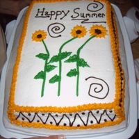 Sunflowers This was the second cake I did for class I was taking at the college. We only did ther flowers and the border at the bottom and I added the...