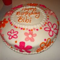 Flowered Birthday Cake made this for my sisters birthday. my first try using fondant...decorations are BC.