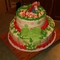 Strawberry Shortcake This is a 12" white cake with strawberry filling frosted in buttercream topped with a 8" chocolate filled & frosted with...